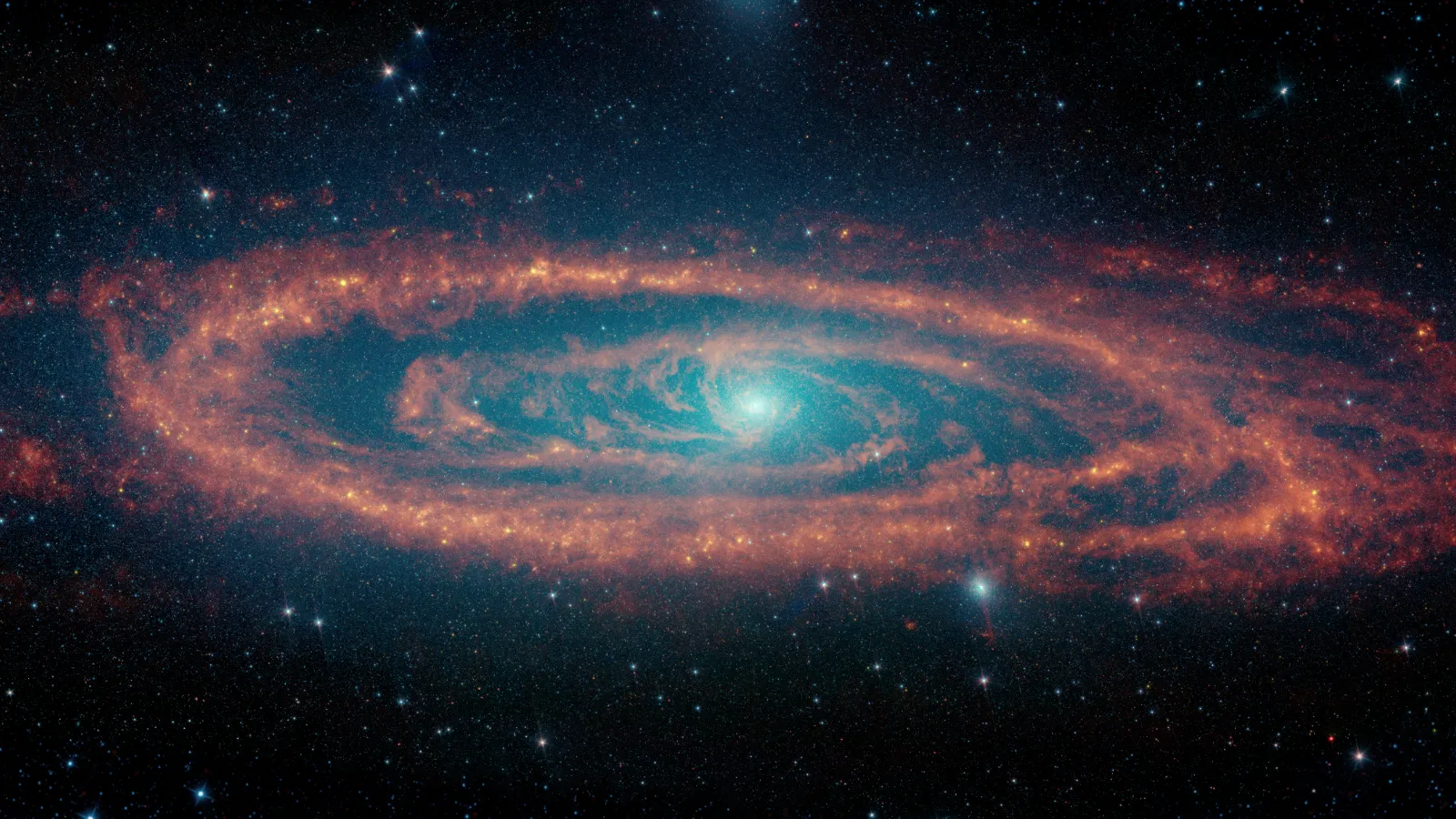 The Andromeda galaxy's stars and dust clouds pictured by NASA's retired Spitzer Space Telescope.
