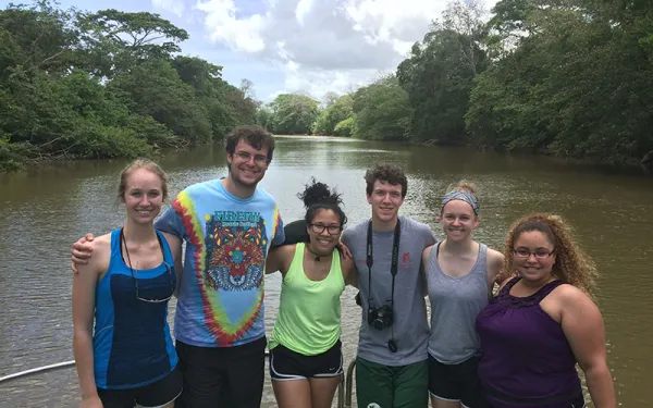 students on a river boat in a study abroad experience