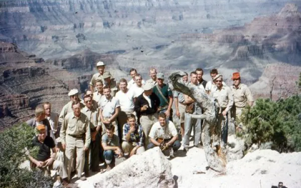 Field Camp group photo from 1955 overlooking a canyon