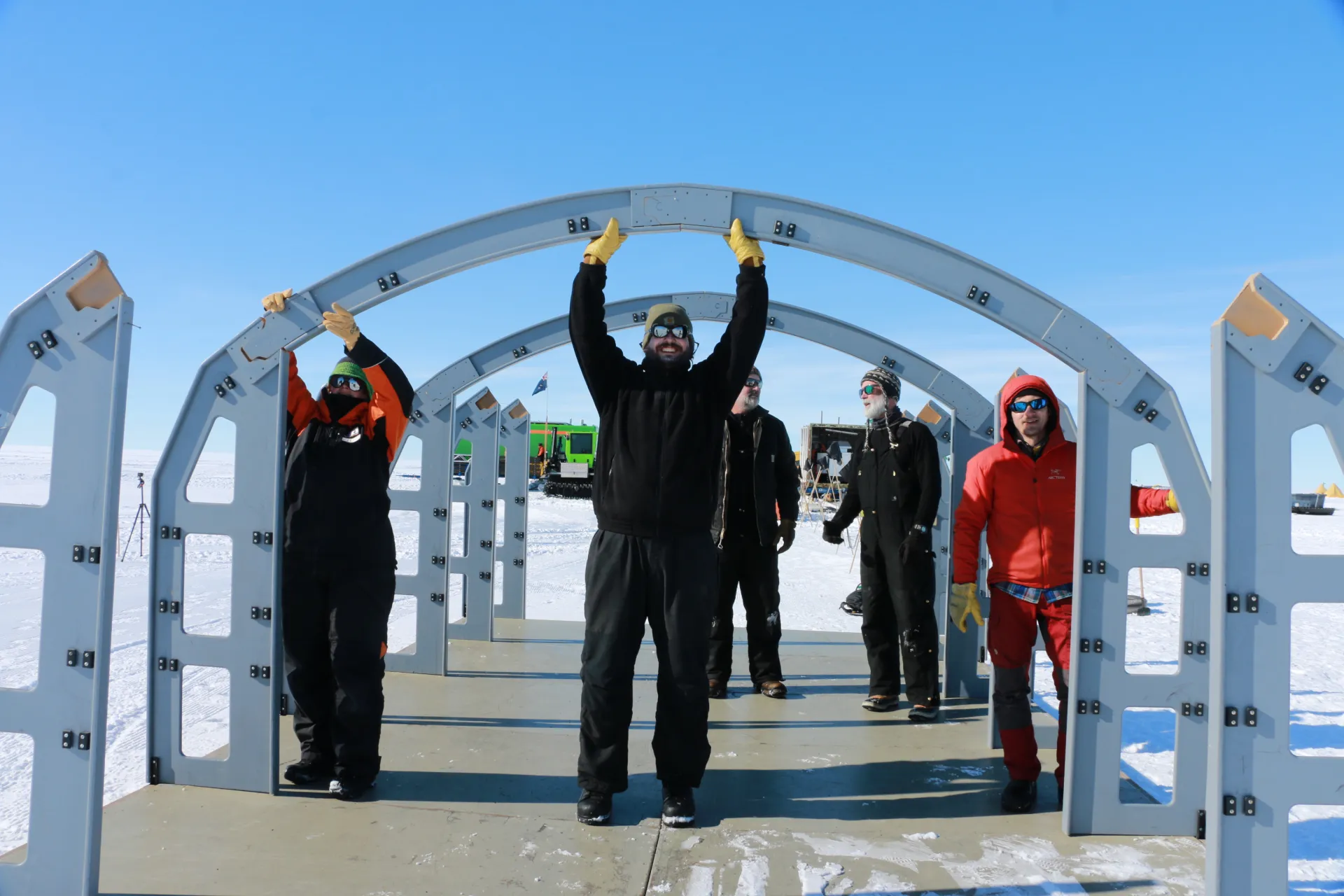 Co-Chief scientist Tina van de Flierdt, Dr. Jason Coenen, and Dr. Alex Michaud work together to assemble the science tent at the SWAIS2C drill site on the Ross Ice Shelf, Antarctica. Photo credit: Veronika Meduna.